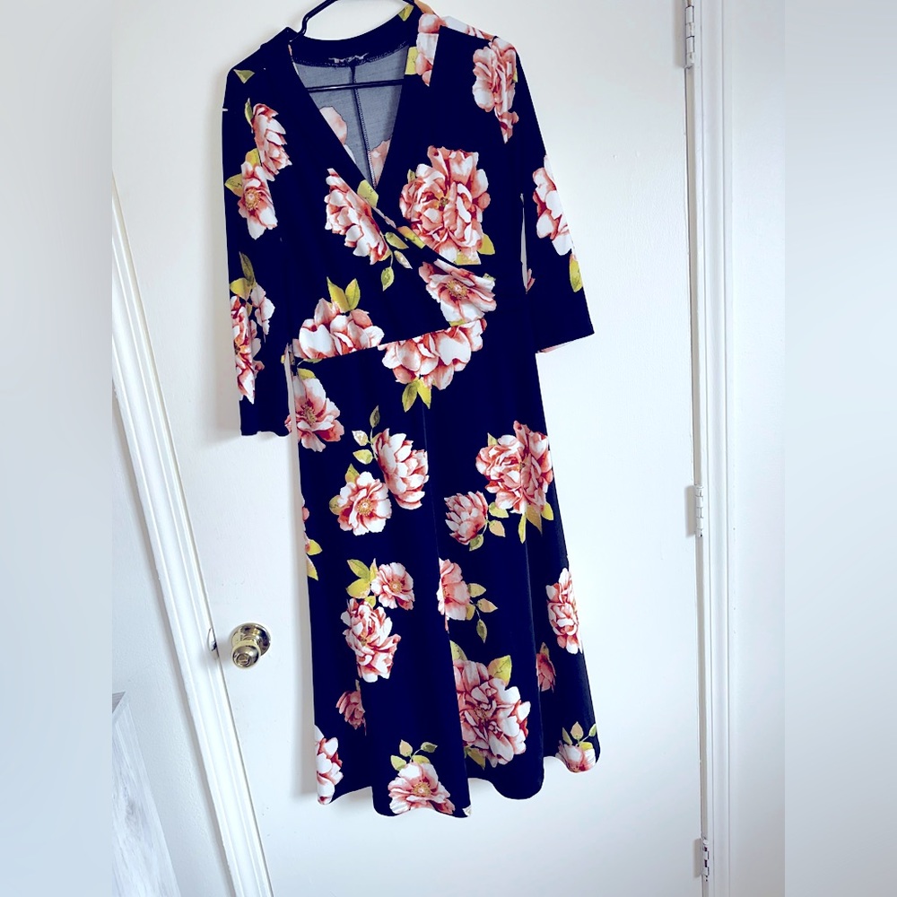 Black floral dress, white floral dress